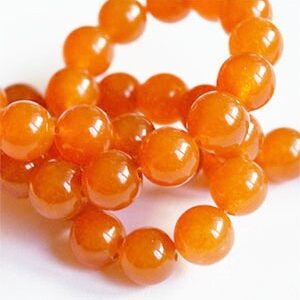 Jade  8mm luonnonkivi värjätty oranssi, reikä 1mm, pakkaus 10 kpl