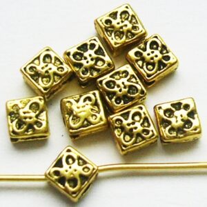 Kultainen metallihelmi 6x6,5mm, reikä 0,8mm, 10 kpl pakkauksessa