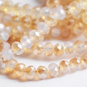 Lihvitud rondell 6x4mm piimjas-kuldne, ava 1mm, pakis 23 tk