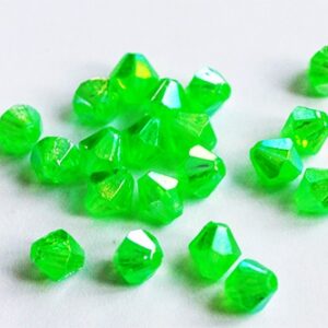 Akrüülhelhelmes romb 7x6mm, läbipaistev roheline, ava 0,8mm, pakis 20 tk