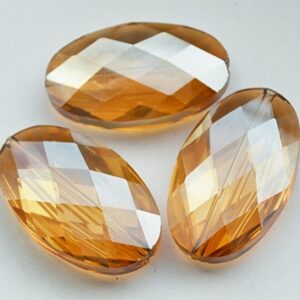 Klaashelmes 30x20x10mm, ovaalne lihvitud vikerkaare läige, topaas, 1 tk