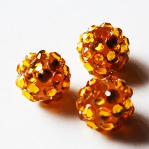 Kivikestega akrüülhelmes 12-11mm, ava 2-2,5mm oranž, pakis 1 tk