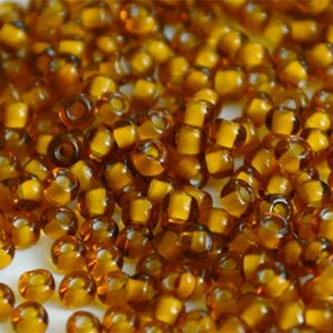 Jaapani seemnehelmed 2x1,5mm, ava 0,8mm, pruun/kollane, 5 gr.
