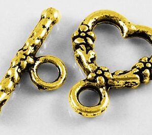 Koristeellinen salpalukko 18x14mm, antiikkikulta, 1 kpl